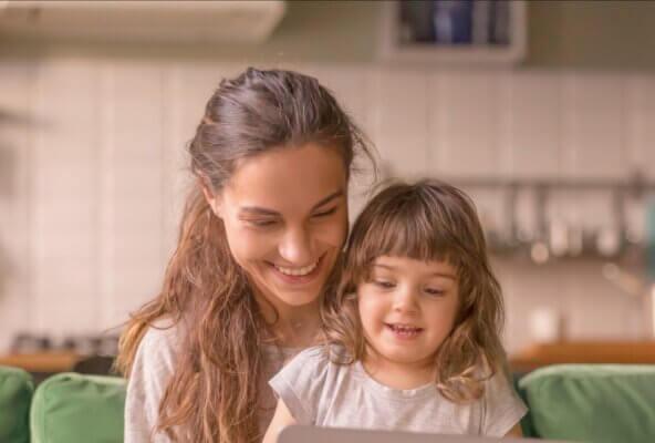 Doctor and daughter looking at how to start a medical practice website checklist