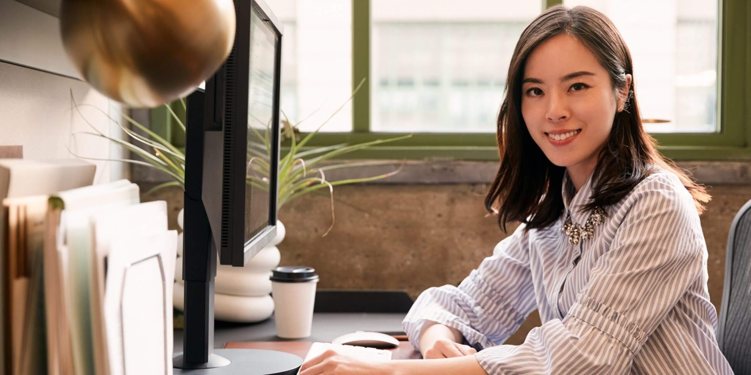 woman smiling after downloading medical billing ideal customer profile template