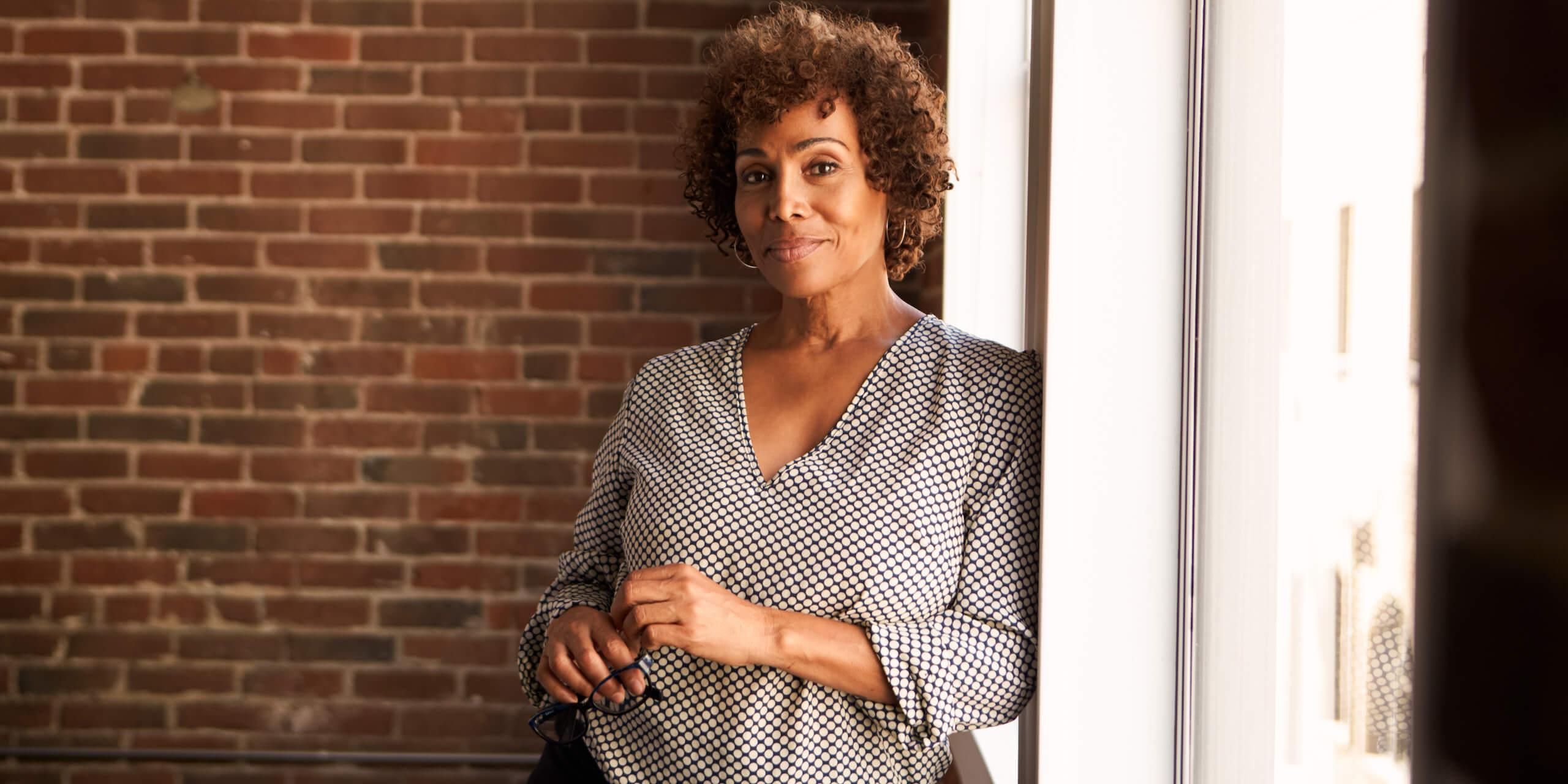 woman contemplating social media tips for medical practices