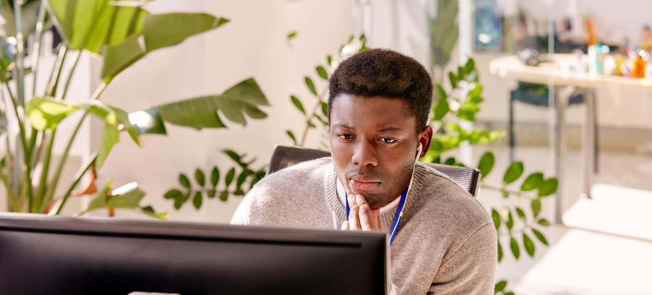 front office worker looking at computer