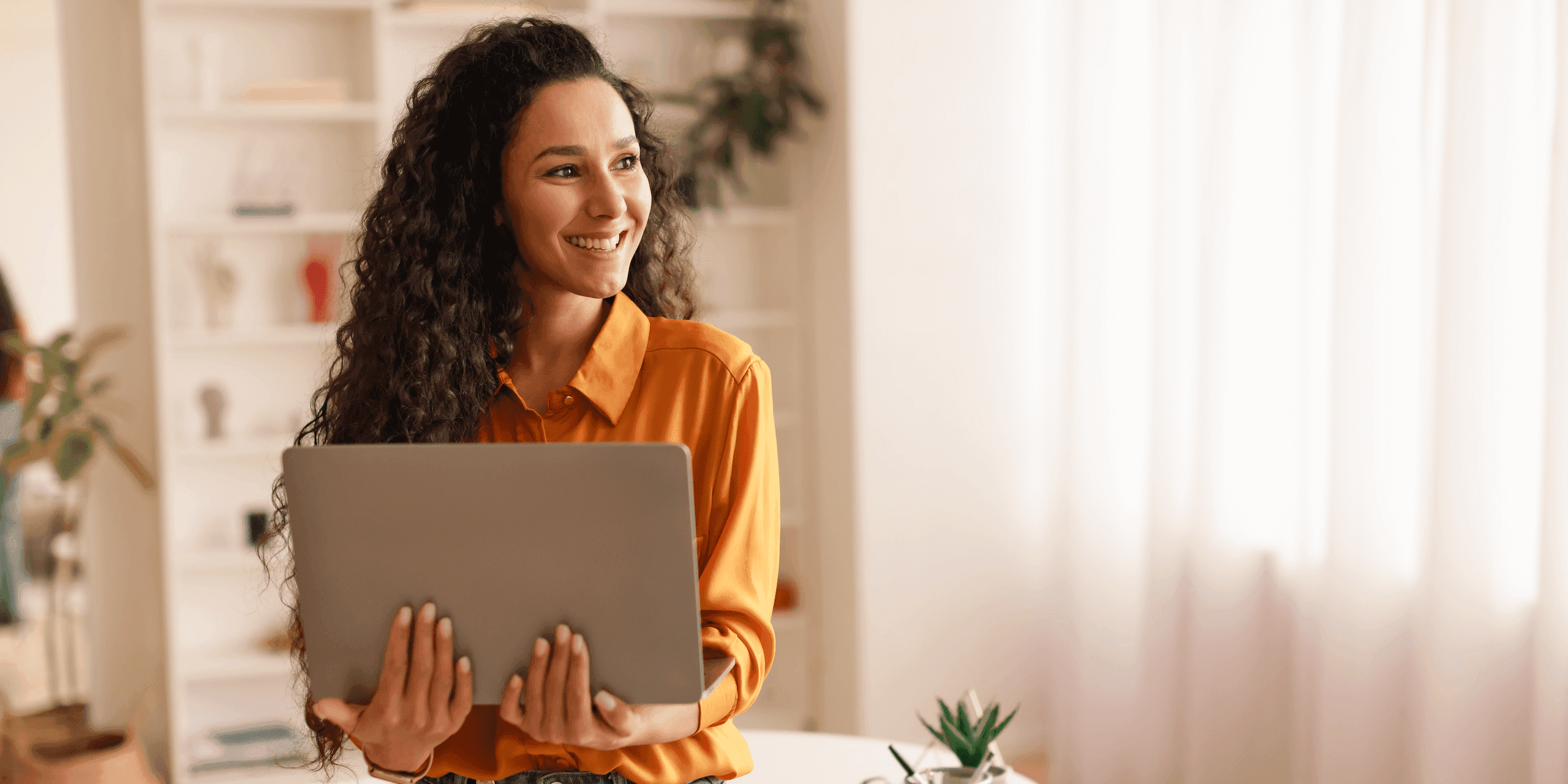woman smiling after getting licensing for starting a new medical practice business