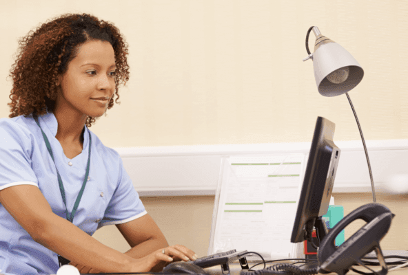 image of woman researching best practices on physician recruitment for medical practice