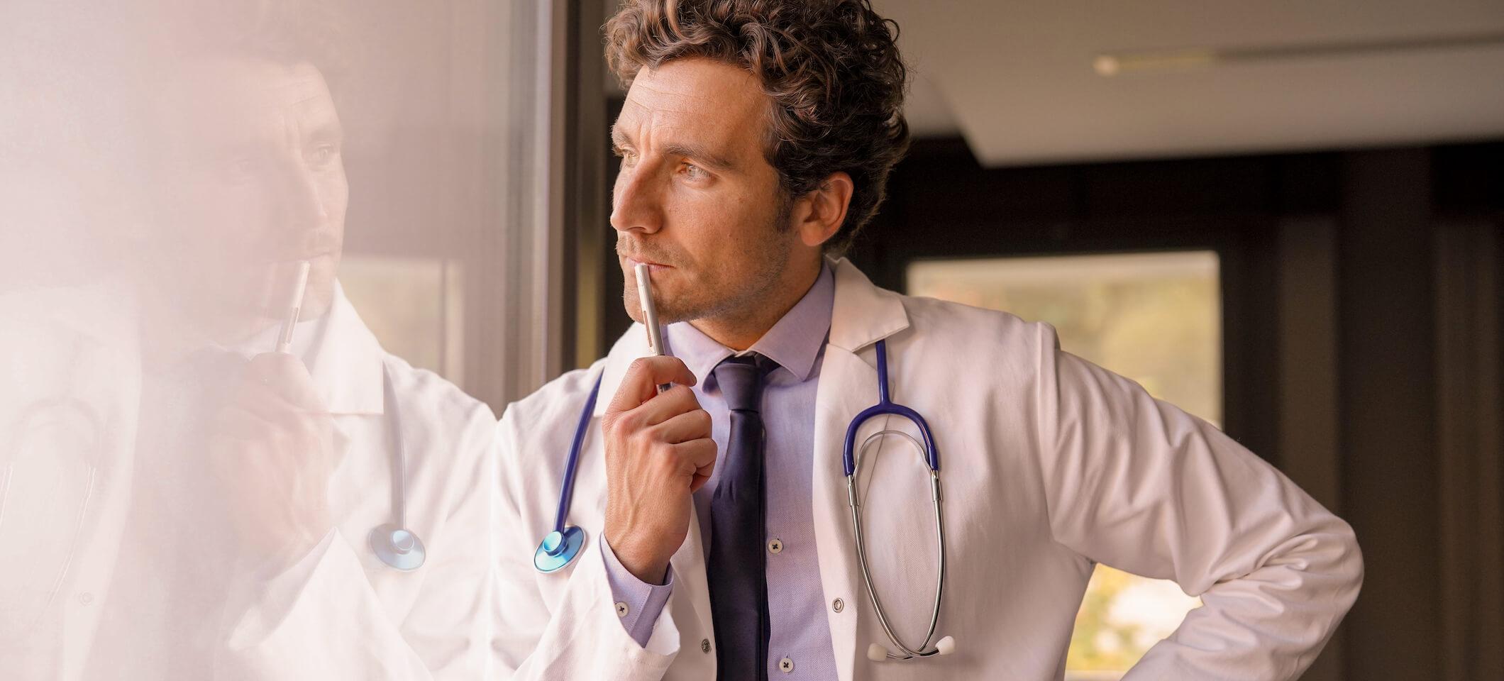 doctor contemplating podiatry marketing