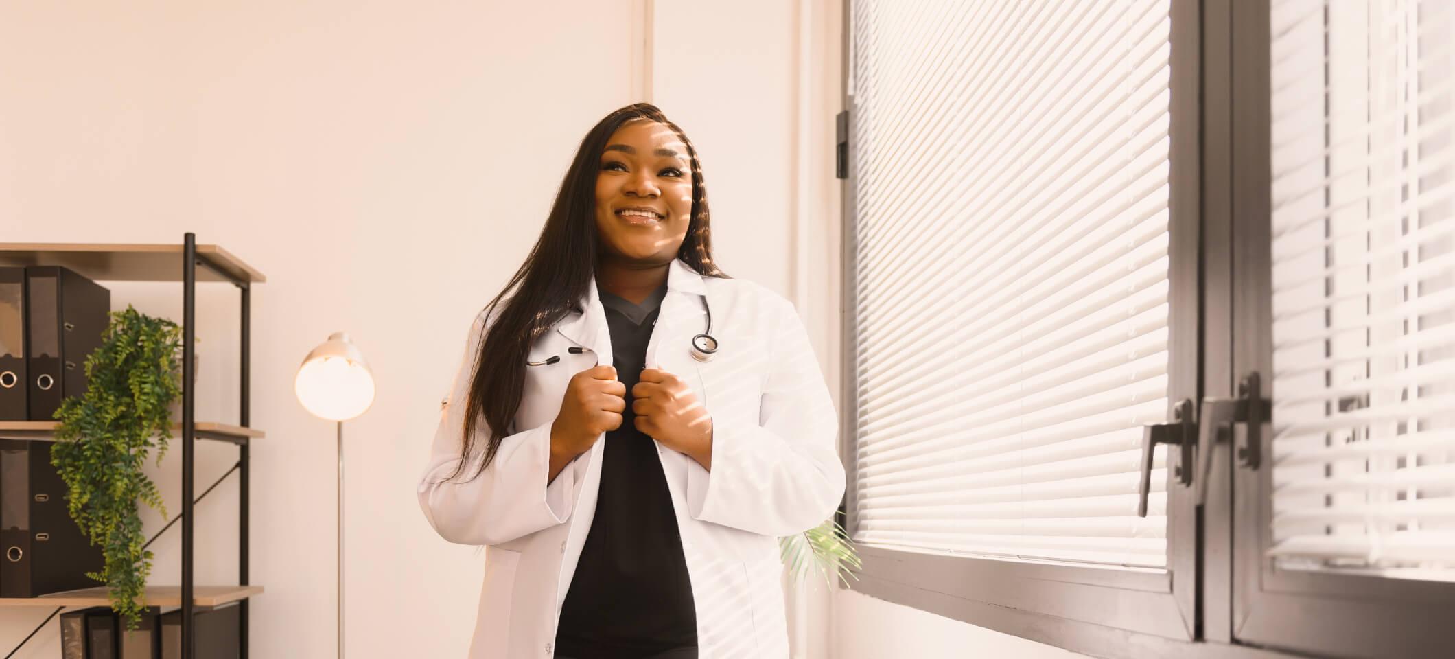 Physician smiles for website photo as part of branding in healthcare