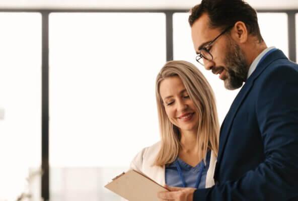 Billing company manager speaks with physician client