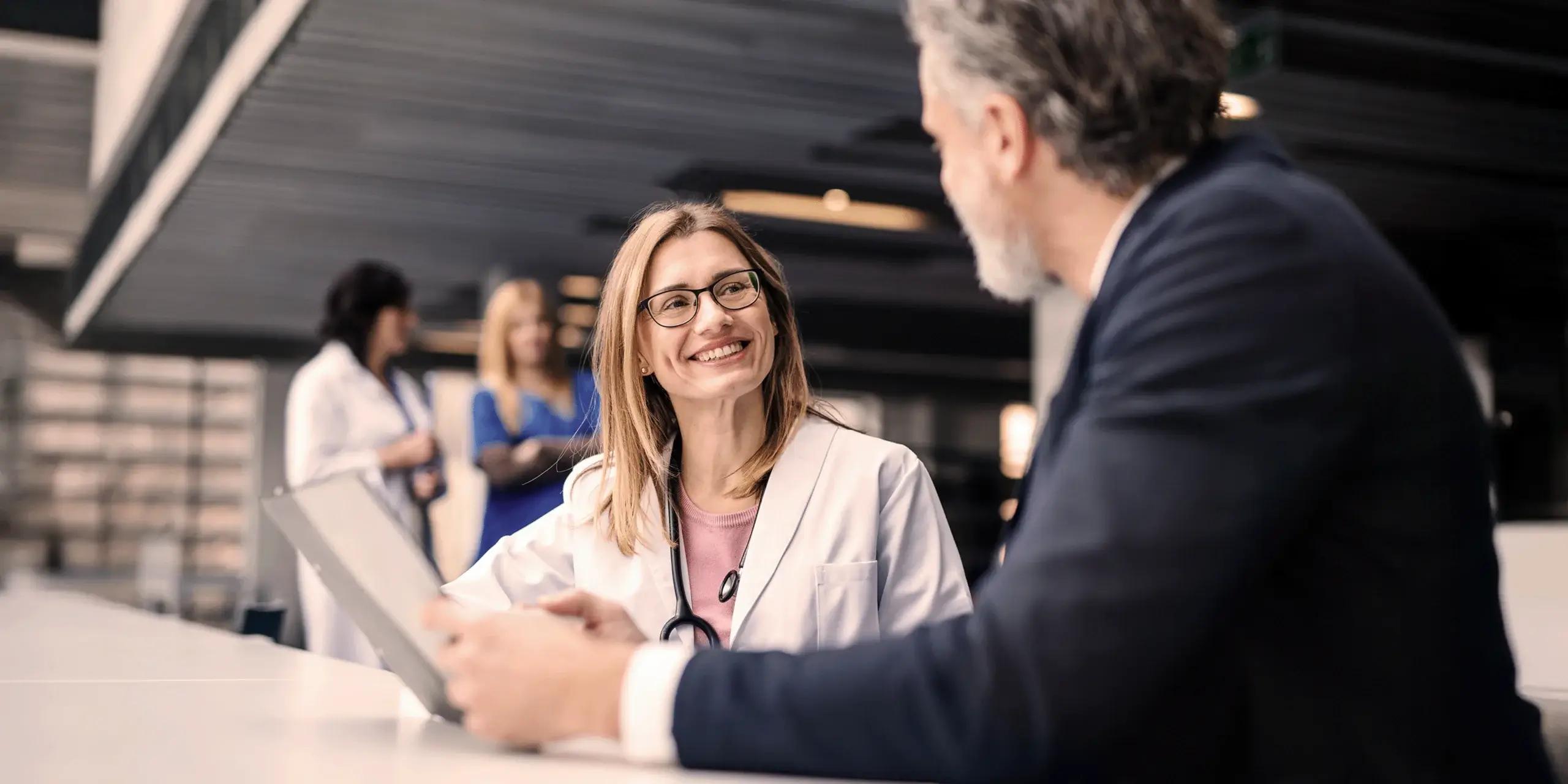 healthcare and business professionals collaborating