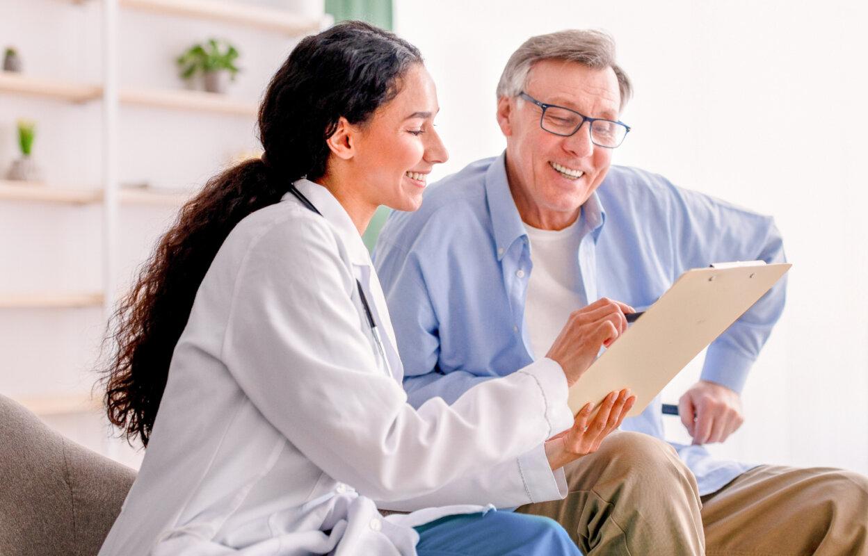 Physician and patient discuss Men's Health Month as part of June healthcare observances