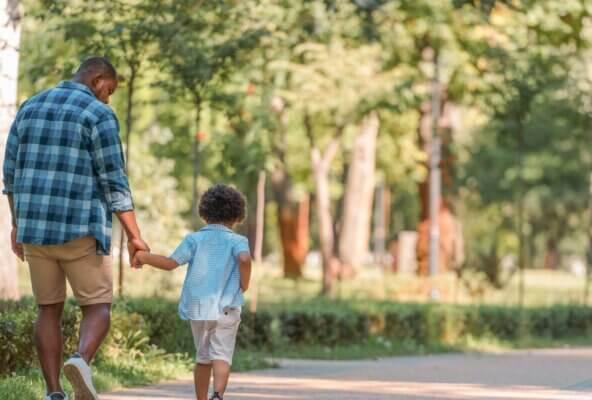 father and child following summer health tips