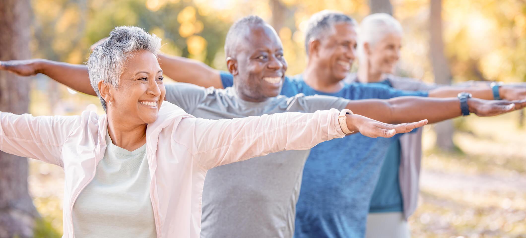 Seniors exercise outdoors observing Summer Sun Safety Month in August 2025 healthcare observances