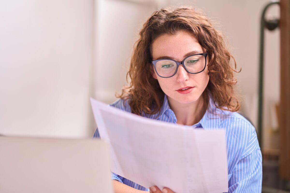 Person reading FAQs about deductible reset season.