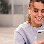 Physician takes a break from exercising to read about medical practice social media