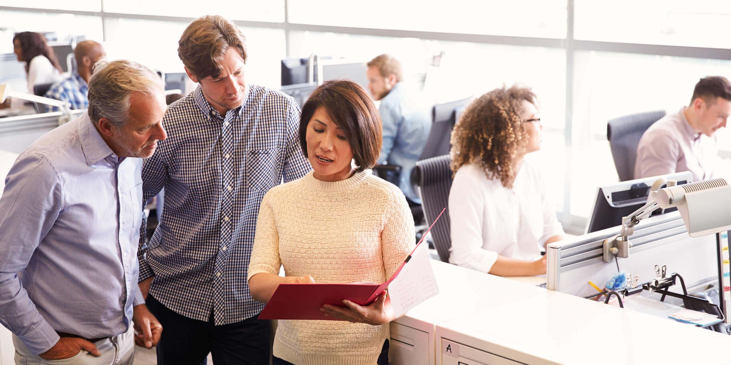 Professionals reviewing how to build business plan for medical practice