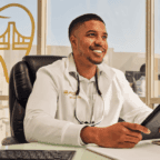 Physician smiling after optimizing images on Google business profile for medical practice.
