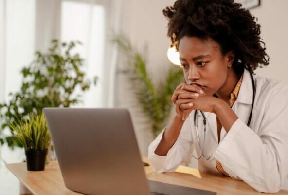 doctor reading about physician burnout