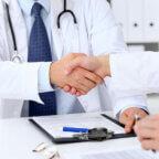 doctors shaking hands after referring patients to another physician