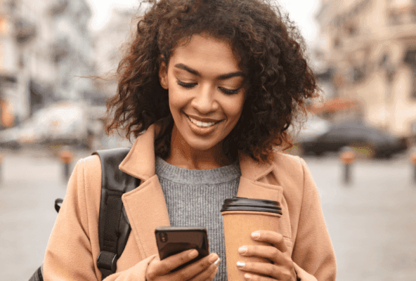 Woman on phone engaging in social media self diagnosis