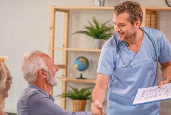 physician shaking hands with a patient at independent practice