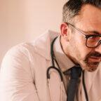 Physician assisting patient while wondering is concierge medicine legal
