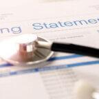 Billing statement and stethoscope with revenue cycle management healthcare news