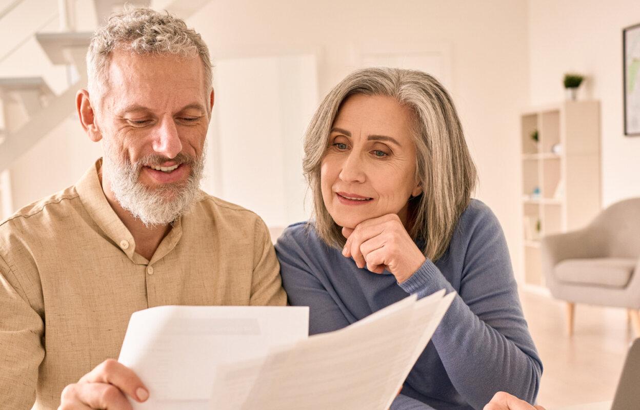 Patients look at medical billing documents enabling a good patient payment experience