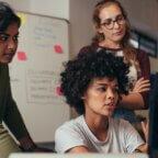 colleagues discussing diagnosis vs external cause coding