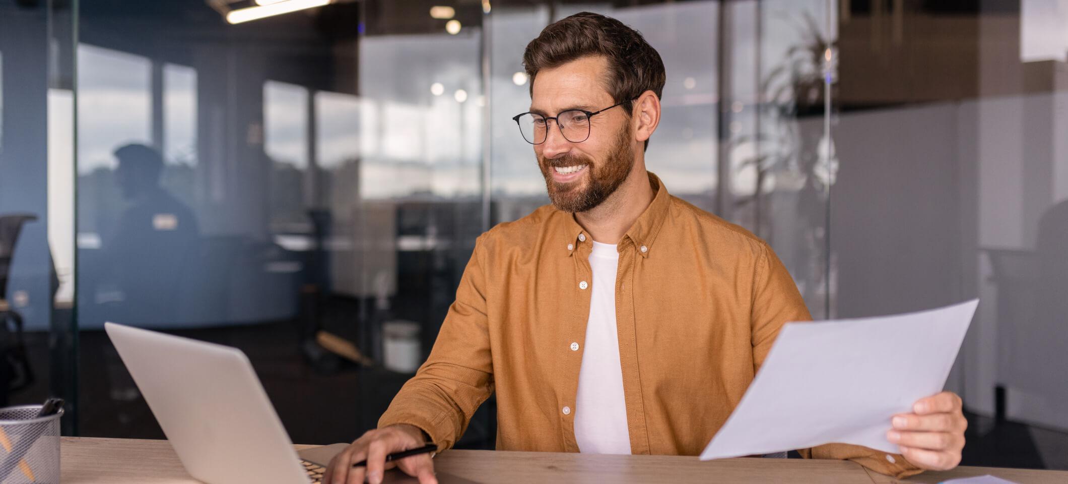 Medical billing professional reads about February 2025 revenue cycle management news