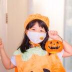 child patient celebrating October healthcare observances