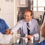 Biller demonstrates medical billing company financial resilience by meeting with doctors and healthcare staff