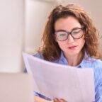 Person reading FAQs about deductible reset season.